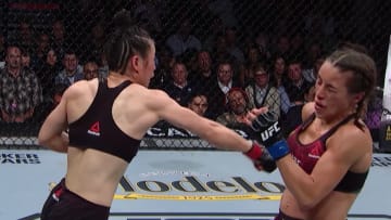Zhang Weili and Joanna Jedrzejczyk trading blows at UFC 248